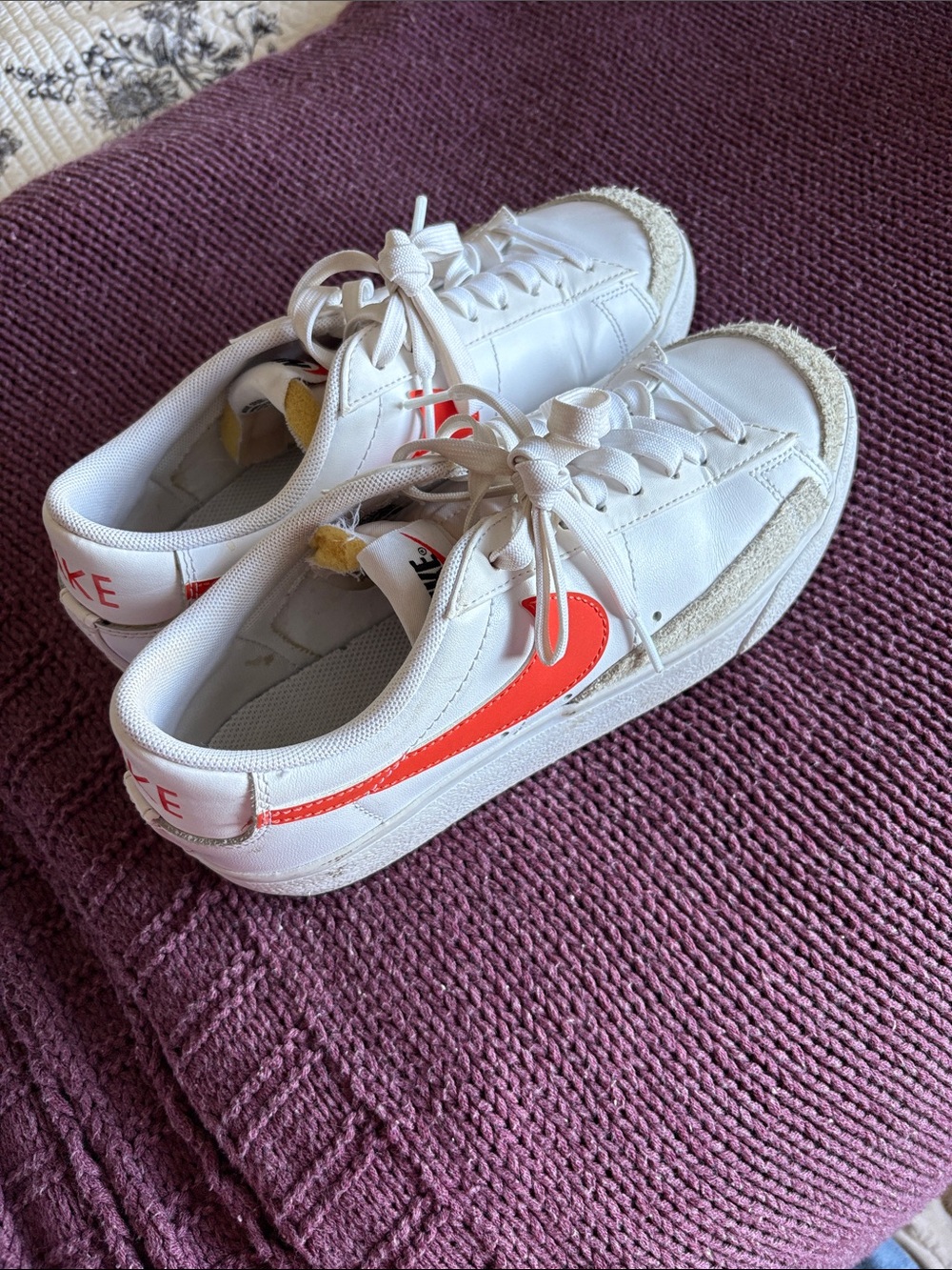 Nike White Sneakers with Bright Orange Swoosh